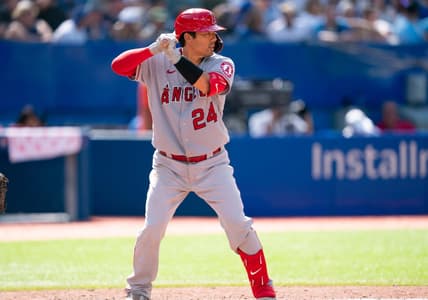 Aug 28, 2022; Toronto, Ontario, CAN; Los Angeles Angels catcher Kurt Suzuki (24) waits for a pitch against the Toronto Blue Jays during the seventh inning at Rogers Centre. Mandatory Credit: Nick Turchiaro-USA TODAY Sports
