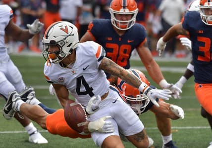 Sep 10, 2022; Champaign, Illinois, USA; Virginia Cavaliers wide receiver Dontayvion Wicks (3) rubles the ball on a tackle by Illinois Fighting Illini defensive back Sydney Brown (30) in the first half at Memorial Stadium. Mandatory Credit: Ron Johnson-USA TODAY Sports