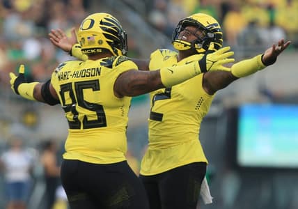 Oregon's Keyon Ware-Hudson, left, and DJ Johnson celebrate a stop against Eastern Washington during the second quarter Saturday Sept 10, 2022.

Eug 091022 Uo Football 08