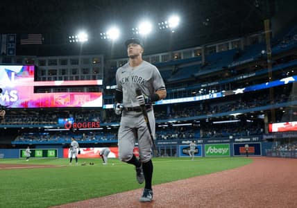 Sep 28, 2022; Toronto, Ontario, CAN; New York Yankees designated hitter Aaron Judge (99) runs towards the dugout during the pregame against the Toronto Blue Jays at Rogers Centre. Mandatory Credit: Nick Turchiaro-USA TODAY Sports