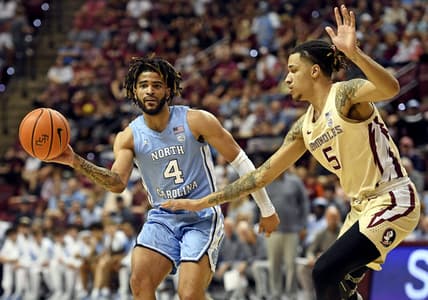 Feb 27, 2023; Tallahassee, Florida, USA; North Carolina Tar Heels guard RJ Davis (4) passes the ball during the first half against the Florida State Seminoles at Donald L. Tucker Center. Mandatory Credit: Melina Myers-USA TODAY Sports
