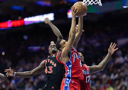 Mar 31, 2023; Philadelphia, Pennsylvania, USA; Philadelphia 76ers guard De'Anthony Melton (8) rebounds the ball past Toronto Raptors forward Pascal Siakam (43) during the second quarter at Wells Fargo Center. Mandatory Credit: Bill Streicher-USA TODAY Sports