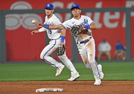 Apr 3, 2023; Kansas City, Missouri, USA;  Kansas City Royals shortstop Nicky Lopez (8) throws to first base for an out during the fifth inning against the Toronto Blue Jays at Kauffman Stadium. Mandatory Credit: Peter Aiken-USA TODAY Sports