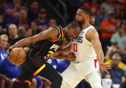 Apr 25, 2023; Phoenix, Arizona, USA; Phoenix Suns forward Kevin Durant (35) drives to the basket against Los Angeles Clippers guard Eric Gordon (10) during the first half in game five of the 2023 NBA playoffs at Footprint Center. Mandatory Credit: Mark J. Rebilas-USA TODAY Sports