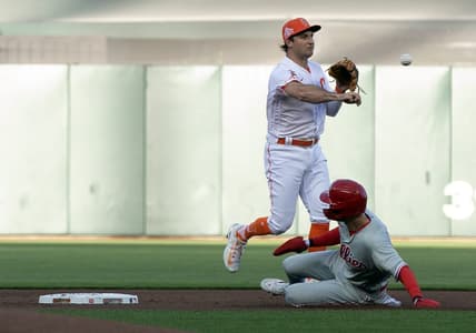 May 16, 2023; San Francisco, California, USA; San Francisco Giants shortstop Casey Schmitt (6) throws over Philadelphia Phillies shortstop Trea Turner (7) to complete a double play during the first inning at Oracle Park. Bryce Harper was out at first. Mandatory Credit: D. Ross Cameron-USA TODAY Sports