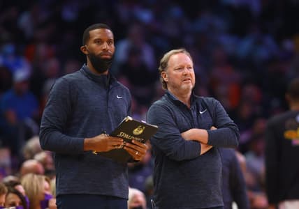 Feb 10, 2022; Phoenix, Arizona, USA; Milwaukee Bucks head coach Mike Budenholzer (right) and assistant coach Charles Lee against the Phoenix Suns in the second half at Footprint Center. Mandatory Credit: Mark J. Rebilas-USA TODAY Sports