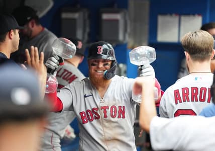 Jul 1, 2023; Toronto, Ontario, CAN; Boston Red Sox designated hitter Justin Turner (2) celebrates in the dugout after hitting a home run against the Toronto Blue Jays during the ninth inning at Rogers Centre. Mandatory Credit: Nick Turchiaro-USA TODAY Sports