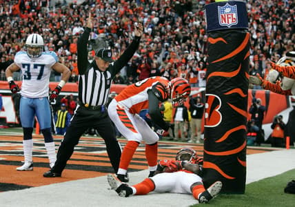 Tennessee Titans safety Calvin Lowry (37) watches as Cincinnati Bengals wide receiver Chad Johnson (85) and teammate Chris Henry (15) celebrate a touchdown in the fourth quarter during their game at Paul Brown Stadium.
November 25, 2007 (photo GEORGE WALKER IV / THE TENNESSEAN)