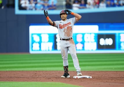 Jul 31, 2023; Toronto, Ontario, CAN; Baltimore Orioles right fielder Anthony Santander (25) celebrates hitting a double against the Toronto Blue Jays during the third inning at Rogers Centre. Mandatory Credit: Nick Turchiaro-USA TODAY Sports