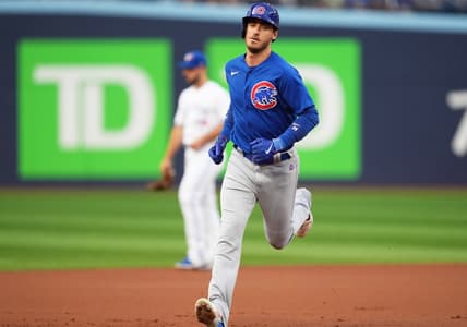 Aug 11, 2023; Toronto, Ontario, CAN; Chicago Cubs first baseman Cody Bellinger (24) runs the bases after hitting a two run home run against the Toronto Blue Jays during the first inning at Rogers Centre. Mandatory Credit: Nick Turchiaro-USA TODAY Sports