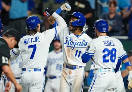 Aug 15, 2023; Kansas City, Missouri, USA; Kansas City Royals shortstop Bobby Witt Jr. (7) is congratulated by third baseman Maikel Garcia (11) and center fielder Kyle Isbel (28) after hitting a grand slam during the fifth inning against the Seattle Mariners at Kauffman Stadium. Mandatory Credit: Jay Biggerstaff-USA TODAY Sports