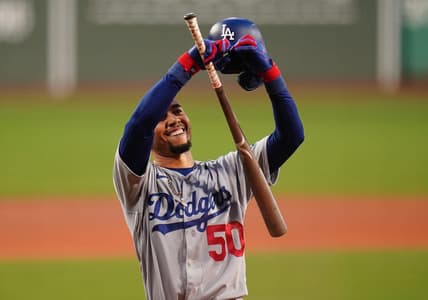 Aug 25, 2023; Boston, Massachusetts, USA; Los Angeles Dodgers right fielder Mookie Betts (50) reacts to the crowd before batting against the Boston Red Sox in the first inning at Fenway Park. Mandatory Credit: David Butler II-USA TODAY Sports
