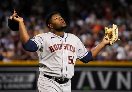 Sep 30, 2023; Phoenix, AZ, USA; Houston Astros relief pitcher Hector Neris (50) reacts after striking out Arizona Diamondbacks Ketel Marte (4) with the bases loaded to end the seventh inning at Chase Field. Mandatory Credit: Rob Schumacher-Arizona Republic