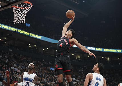 Oct 29, 2021; Toronto, Ontario, CAN; Toronto Raptors forward Scottie Barnes (4) scores a basket during the second quarter against the Orlando Magic at Scotiabank Arena. Mandatory Credit: Nick Turchiaro-USA TODAY Sports