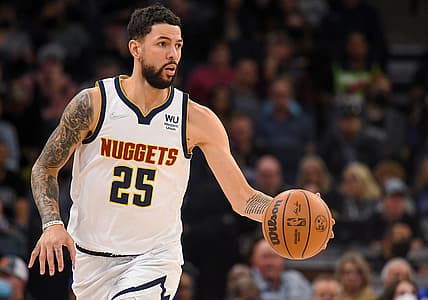Oct 30, 2021; Minneapolis, Minnesota, USA;  Denver Nuggets guard Austin Rivers (25) controls the ball against the Minnesota Timberwolves at Target Center. Mandatory Credit: Nick Wosika-USA TODAY Sports