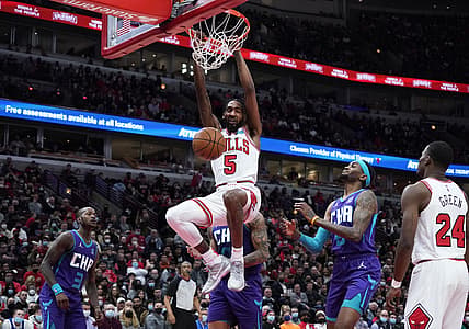 Nov 29, 2021; Chicago, Illinois, USA; Chicago Bulls forward Derrick Jones Jr. (5) dunks the ball against the Charlotte Hornets during the first half at United Center. Mandatory Credit: David Banks-USA TODAY Sports
