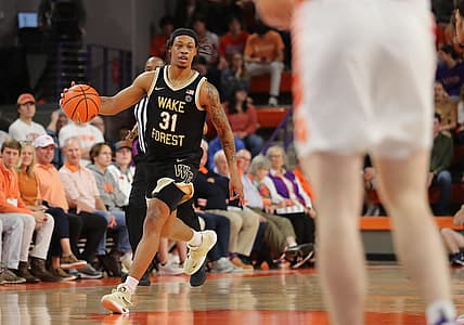 Feb 23, 2022; Clemson, South Carolina, USA; Wake Forest Demon Deacons guard Alondes Williams (31) dribbles the ball against the Clemson Tigers during the first half at Littlejohn Coliseum. Mandatory Credit: Dawson Powers-USA TODAY Sports