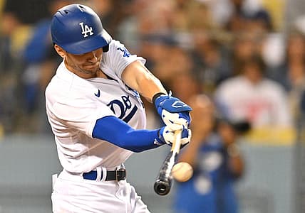 Jul 25, 2022; Los Angeles, California, USA; Los Angeles Dodgers shortstop Trea Turner (6) doubles in the fourth inning against the Washington Nationals at Dodger Stadium. Mandatory Credit: Jayne Kamin-Oncea-USA TODAY Sports