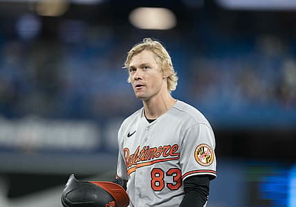Jun 13, 2022; Toronto, Ontario, CAN; Baltimore Orioles outfielder Kyle Stowers (83) walks towards the dugout after hitting an RBI double during his MLB debut against the Toronto Blue Jays during the seventh inning at Rogers Centre. Mandatory Credit: Nick Turchiaro-USA TODAY Sports
