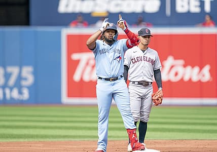 Aug 13, 2022; Toronto, Ontario, CAN; Toronto Blue Jays first baseman Vladimir Guerrero Jr. (27) celebrates hitting a double against the Cleveland Guardians during the first inning at Rogers Centre. Mandatory Credit: Nick Turchiaro-USA TODAY Sports