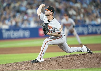 Aug 17, 2022; Toronto, Ontario, CAN; Baltimore Orioles relief pitcher Logan Gillaspie (71) throws a pitch against the Toronto Blue Jays during the eighth inning at Rogers Centre. Mandatory Credit: Nick Turchiaro-USA TODAY Sports