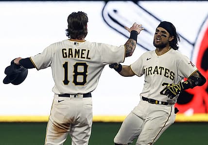 Aug 19, 2022; Pittsburgh, Pennsylvania, USA; Pittsburgh Pirates first baseman Michael Chavis (2) celebrates his game winning walk off single with right fielder Ben Gamel (18) to defeat the Cincinnati Reds during the ninth inning at PNC Park. The Pirates won 5-4. Mandatory Credit: Charles LeClaire-USA TODAY Sports