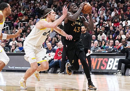 Feb 10, 2023; Toronto, Ontario, CAN; Toronto Raptors forward Pascal Siakam (43) drives to the basket as Utah Jazz forward Kelly Olynyk (41) tries to defend during the second quarter at Scotiabank Arena. Mandatory Credit: Nick Turchiaro-USA TODAY Sports