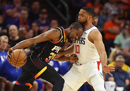 Apr 25, 2023; Phoenix, Arizona, USA; Phoenix Suns forward Kevin Durant (35) drives to the basket against Los Angeles Clippers guard Eric Gordon (10) during the first half in game five of the 2023 NBA playoffs at Footprint Center. Mandatory Credit: Mark J. Rebilas-USA TODAY Sports