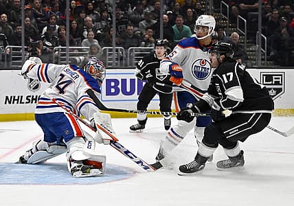 Apr 4, 2023; Los Angeles, California, USA; Edmonton Oilers goaltender Stuart Skinner (74) makes a save off a shot by Los Angeles Kings center Zack MacEwen (17) in the second period at Crypto.com Arena. Mandatory Credit: Jayne Kamin-Oncea-USA TODAY Sports