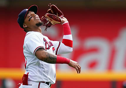 Sep 10, 2023; Cumberland, Georgia, USA; Atlanta Braves shortstop Orlando Arcia (11) catches a pop fly for an out against the Pittsburgh Pirates during the seventh inning at Truist Park. Mandatory Credit: John David Mercer-USA TODAY Sports