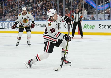 Oct 16, 2023; Toronto, Ontario, CAN; Chicago Blackhawks center Connor Bedard (98) shoots the puck on net against the Toronto Maple Leafs during the second period at Scotiabank Arena. Mandatory Credit: Nick Turchiaro-USA TODAY Sports