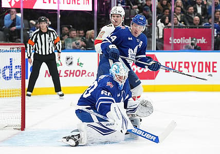 Nov 28, 2023; Toronto, Ontario, CAN; Florida Panthers left wing Matthew Tkachuk (19) battle in front of the net with Toronto Maple Leafs defenseman Morgan Rielly (44) during the second period at Scotiabank Arena. Mandatory Credit: Nick Turchiaro-USA TODAY Sports