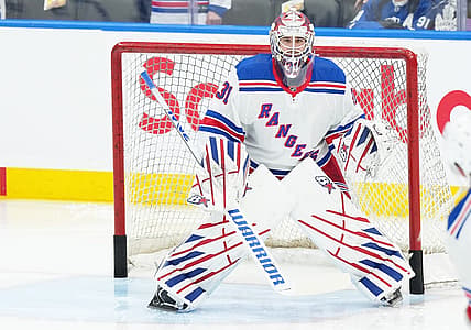 Dec 19, 2023; Toronto, Ontario, CAN; New York Rangers goaltender Igor Shesterkin (31) takes pucks during the warmup against the Toronto Maple Leafs at Scotiabank Arena. Mandatory Credit: Nick Turchiaro-USA TODAY Sports