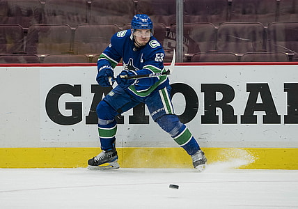 Mar 22, 2021; Vancouver, British Columbia, CAN; Vancouver Canucks forward Bo Horvat (53) skates against the Winnipeg Jets in the second period against the Winnipeg Jets at Rogers Arena. Jets won 4-0.  Mandatory Credit: Bob Frid-USA TODAY Sports