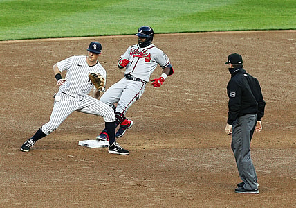 Apr 20, 2021; Bronx, New York, USA; Atlanta Braves center fielder Guillermo Heredia (38) goes into second base after hitting a double against the New York Yankees during the third inning at Yankee Stadium. Mandatory Credit: Andy Marlin-USA TODAY Sports