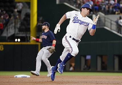 May 1, 2021; Arlington, Texas, USA; Texas Rangers second baseman Nick Solak rounds second base on a single by Texas Rangers center fielder Joey Gallo during the first inning against the Boston Red Sox at Globe Life Field. Mandatory Credit: Raymond Carlin III-USA TODAY Sports