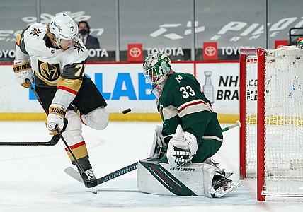May 3, 2021; Saint Paul, Minnesota, USA; Vegas Golden Knights center William Karlsson (71) is stopped by Minnesota Wild goaltender Cam Talbot (33) during the first period at Xcel Energy Center. Mandatory Credit: Nick Wosika-USA TODAY Sports