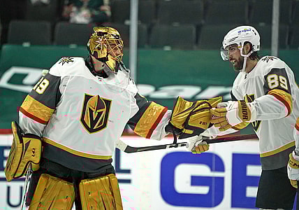 May 22, 2021; Saint Paul, Minnesota, USA; Vegas Golden Knights goalie Marc-Andre Fleury (29) and right wing Alex Tuch (89) celebrate after defeating the Minnesota Wild in game four of the first round of the 2021 Stanley Cup Playoffs at Xcel Energy Center. Mandatory Credit: Nick Wosika-USA TODAY Sports