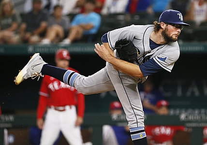 Jun 4, 2021; Arlington, Texas, USA; Tampa Bay Rays starting pitcher Josh Fleming (19) follows thru on a pitch during the first inning against the Texas Rangers at Globe Life Field. Mandatory Credit: Raymond Carlin III-USA TODAY Sports
