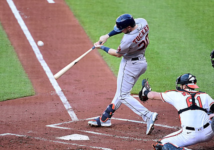 Jun 23, 2021; Baltimore, Maryland, USA; Houston Astros outfielder Kyle Tucker (30) hits an RBI single in the first inning against the Baltimore Orioles at Oriole Park at Camden Yards. Mandatory Credit: Evan Habeeb-USA TODAY Sports