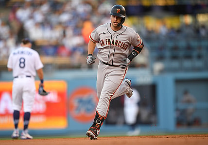 Jul 19, 2021; Los Angeles, California, USA;  San Francisco Giants catcher Buster Posey (28) rounds the bases after hitting a two run home run in the first inning against the Los Angeles Dodgers at Dodger Stadium. Mandatory Credit: Jayne Kamin-Oncea-USA TODAY Sports