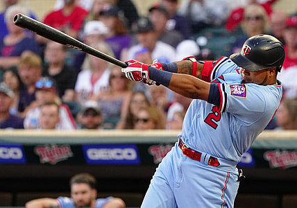 Aug 14, 2021; Minneapolis, Minnesota, USA;  Minnesota Twins infielder Luis Arraez (2) hits an RBI-single off of Tampa Bay Rays starting pitcher Michael Wacha (52) during the first inning at Target Field. Mandatory Credit: Nick Wosika-USA TODAY Sports