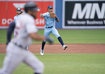 Aug 21, 2021; Toronto, Ontario, CAN; Toronto Blue Jays second baseman Santiago Espinal (5) throws a ball to first base for the out during the second inning against the Detroit Tigers at Rogers Centre. Mandatory Credit: Nick Turchiaro-USA TODAY Sports