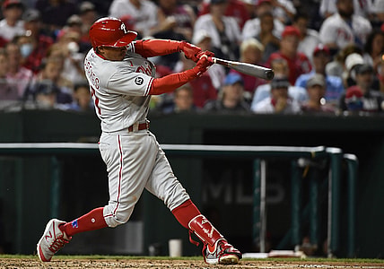 Aug 30, 2021; Washington, District of Columbia, USA; Philadelphia Phillies third baseman Ronald Torreyes (74) hits a three RBI triple against the Washington Nationals during the third inning at Nationals Park. Mandatory Credit: Brad Mills-USA TODAY Sports