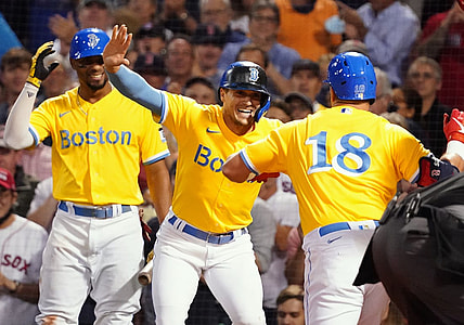Sep 22, 2021; Boston, Massachusetts, USA; Boston Red Sox left fielder Kyle Schwarber (18) celebrates with teammates after hitting a three run home run against the New York Mets in the second inning at Fenway Park. Mandatory Credit: David Butler II-USA TODAY Sports