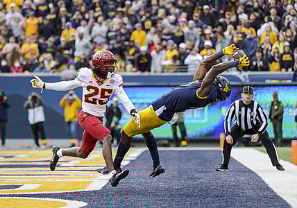 Oct 30, 2021; Morgantown, West Virginia, USA; West Virginia Mountaineers wide receiver Bryce Ford-Wheaton (0) catches a pass for a touchdown during the third quarter against the Iowa State Cyclones at Mountaineer Field at Milan Puskar Stadium. Mandatory Credit: Ben Queen-USA TODAY Sports