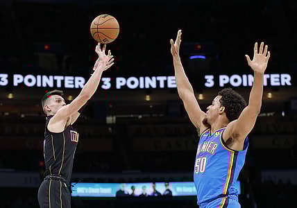 Nov 15, 2021; Oklahoma City, Oklahoma, USA; Miami Heat guard Tyler Herro (14) shoots as Oklahoma City Thunder forward Jeremiah Robinson-Earl (50) defends during the first quarter at Paycom Center. Mandatory Credit: Alonzo Adams-USA TODAY Sports