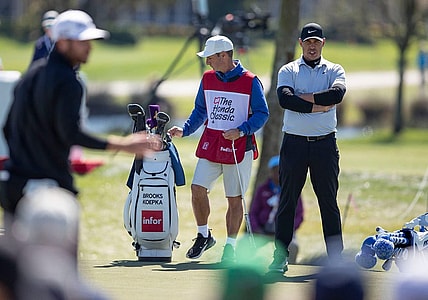Brooks Koepka watches Matthew Wolff putt on the 4th hole during the second round of the Honda Classic at PGA National in Palm Beach Gardens, Feb. 28, 2020.

Brooks Koepka 22