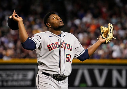 Sep 30, 2023; Phoenix, AZ, USA; Houston Astros relief pitcher Hector Neris (50) reacts after striking out Arizona Diamondbacks Ketel Marte (4) with the bases loaded to end the seventh inning at Chase Field. Mandatory Credit: Rob Schumacher-Arizona Republic