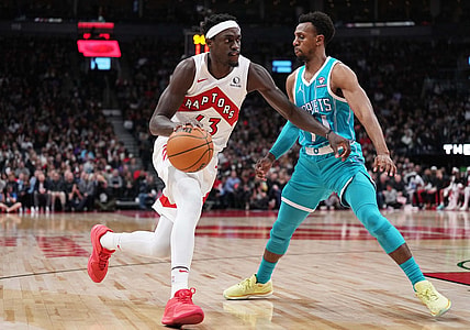 Dec 18, 2023; Toronto, Ontario, CAN; Toronto Raptors forward Pascal Siakam (43) drives to the basket as Charlotte Hornets guard Ish Smith (14) tries to defend during the second quarter at Scotiabank Arena. Mandatory Credit: Nick Turchiaro-USA TODAY Sports